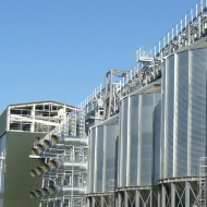 Row of E12 hopper silos with bespoke catwalk system carrying 4 x 300tph Ruberg conveyor lines giving the client maximum flexibility installed in Cambridgeshire, UK in 2008